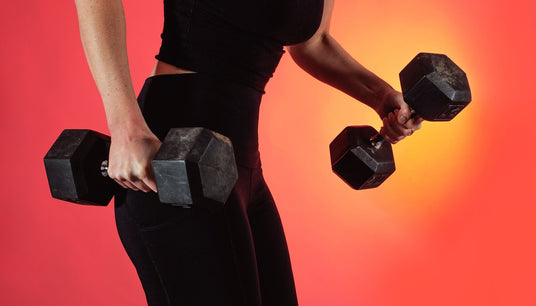 Dressed In Black Holds Two Weights In Each Hand Women Vice Sports